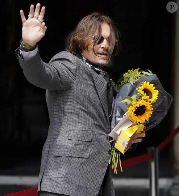 Johnny Depp à son arrivée à la cour royale de justice à Londres, pour le procès en diffamation contre le magazine The Sun Newspaper à Londres, le 23 juillet 2020.