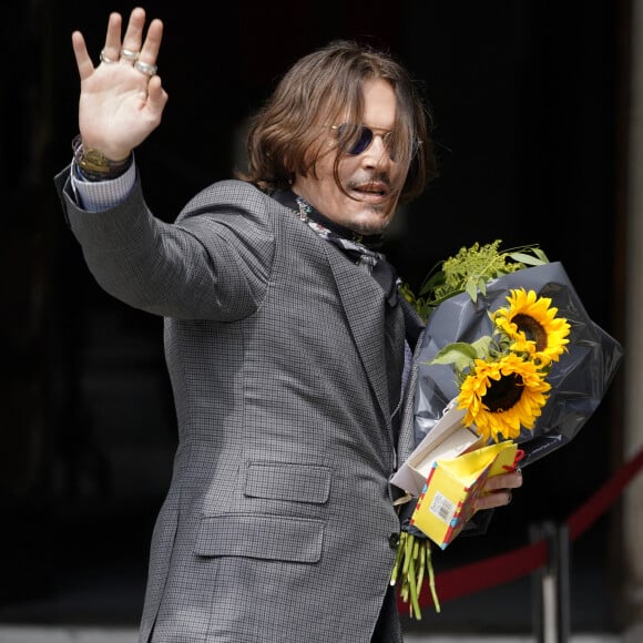 Johnny Depp à son arrivée à la cour royale de justice à Londres, pour le procès en diffamation contre le magazine The Sun Newspaper à Londres, le 23 juillet 2020.