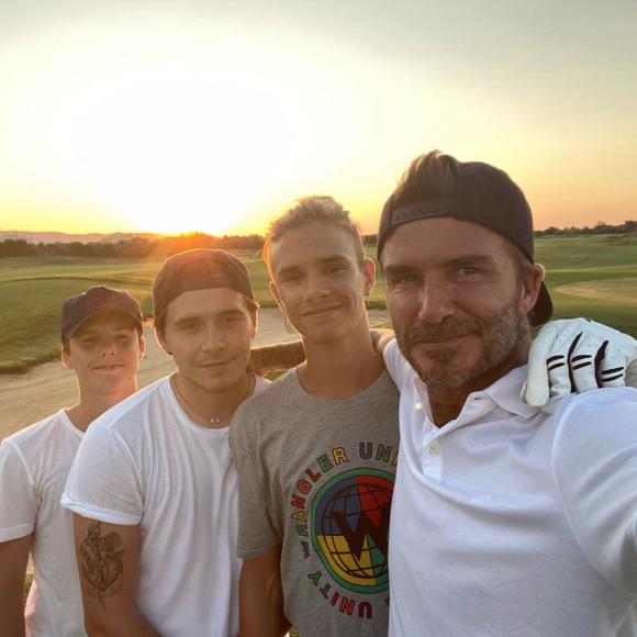 David Beckham et ses trois fils Romeo, Brooklyn et Cruz. Août 2020.