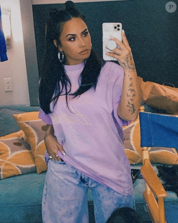 Demi Lovato a partagé cette photo dévoilant ses tatouages sur le bras, sur Instagram. Août 2020.