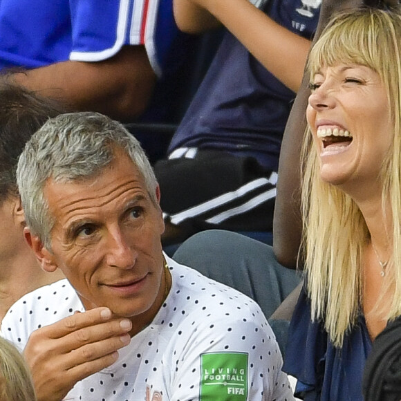 Nagui et sa femme Mélanie Page dans les tribunes lors du quart de finale de la Coupe du Monde Féminine de football opposant les Etats-Unis à la France au Parc des Princes à Paris, France, le 28 juin 2019. Les USA ont gagné 2-1. © Pierre Perusseau/Bestimage