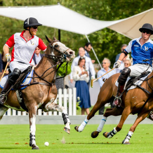 Le prince William, duc de Cambridge et son frère le prince Harry, duc de Sussex lors d'un match de polo de bienfaisance King Power Royal Charity Polo Day à Wokinghan, comté de Berkshire, Royaume Uni, le 10 juillet 2019.