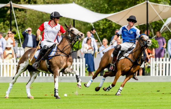 Le prince William, duc de Cambridge et son frère le prince Harry, duc de Sussex lors d'un match de polo de bienfaisance King Power Royal Charity Polo Day à Wokinghan, comté de Berkshire, Royaume Uni, le 10 juillet 2019.