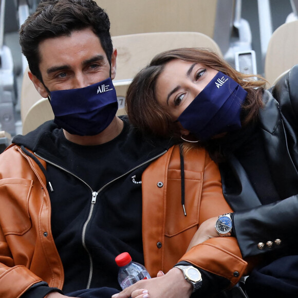 Rachel Legrain-Trapani et son compagnon Valentin Léonard dans les tribunes du tournoi de tennis des Internationaux de Roland Garros à Paris. © Dominique Jacovides / Bestimage