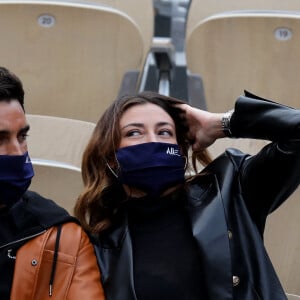 Rachel Legrain-Trapani et son compagnon Valentin Léonard dans les tribunes du tournoi de tennis des Internationaux de Roland Garros à Paris. Le 3 octobre 2020 © Dominique Jacovides / Bestimage