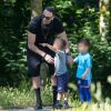 Exclusif - Adil Rami de sortie dans le bois de Boulogne avec son ex-compagne Sidonie Biémont et de leurs deux enfants Zayn et Madi. Printemps 2020.