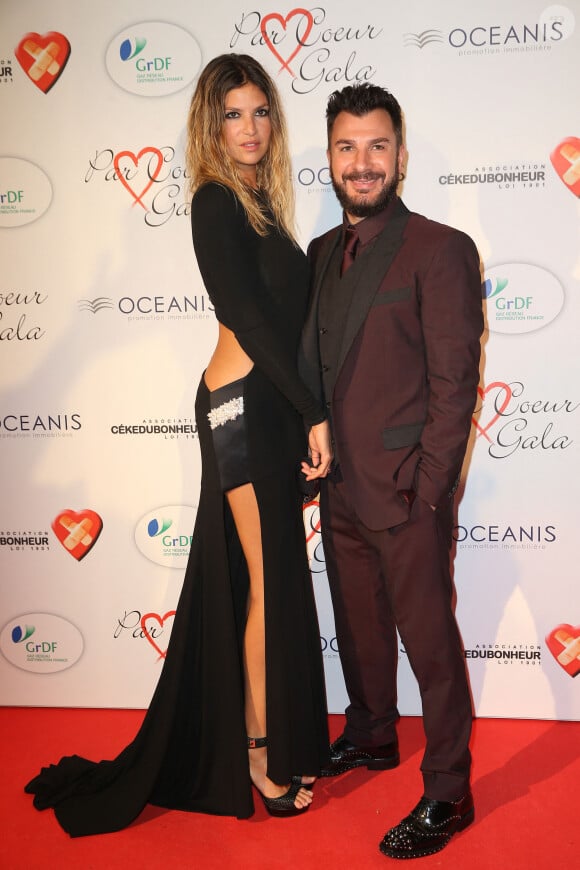 Michaël Youn et sa compagne Isabelle Funaro - Personnalités au gala "Par Coeur" pour les 10 ans de l'association "Cekedubonheur" au pavillon d'Armenonville à Paris. Le 24 septembre 2015 