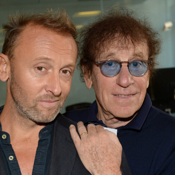 Alain Souchon et son fils Pierre lors de la 14ème édition du Charity Day dans la salle des marchés de la société de courtage Aure BGC au profit des 7 associations participantes à Paris; France, le 11 septembre 2018. © Veeren/Bestimage