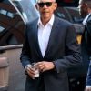 Barack Obama arrive accompagné de ses gardes du corps à l'hôtel The Greenwich à New York, le 21 octobre 20219