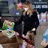 Melania Trump fait une distribution de cadeaux aux enfants des soldats américains sur la base Anacostia-Bolling à Washington, décembre 2020.