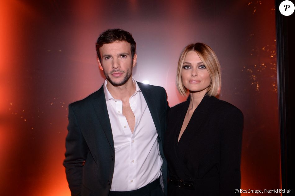 Exclusif - Hugo Philip et sa compagne Caroline Receveur - Soirée de lancement du nouveau parfum Boss "The scent absolute" à l'hôtel Mandarin Oriental à Paris. © Rachid Bellak/Bestimage