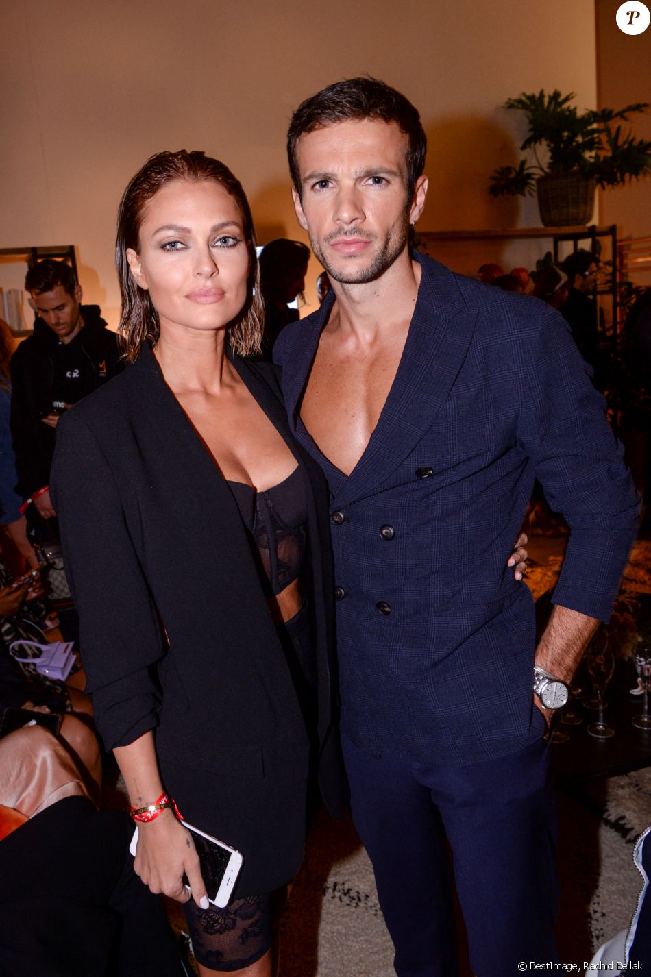 Exclusif - Caroline Receveur et son compagnon Hugo Philip - Les people dans l'espace Experience Immersive réservé aux VIP lors du Etam Live Show 2019 au Stade Roland Garros lors de la fashion week à Paris, le 24 septembre 2019. © Rachid Bellak/Bestimage