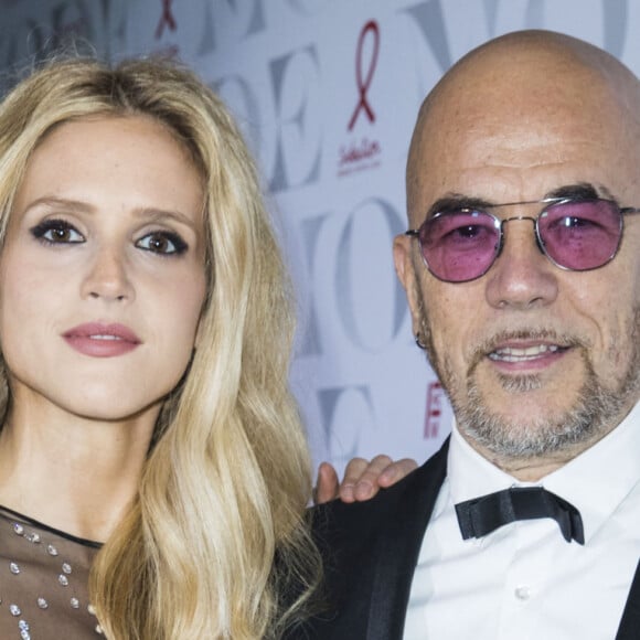 Pascal Obispo et sa femme Julie Hantson au photocall de la 17e édition du "Dîner de la mode du Sidaction" au Pavillon d'Armenonville à Paris, France. © Olivier Borde/Bestimage