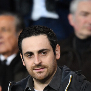 Camille Combal dans les tribunes du parc des Princes lors du match de football de ligue 1, opposant le Paris Saint-Germain (PSG) contre l'Olympique de Marseille (OM) à Paris, France, le 17 mars 2019.