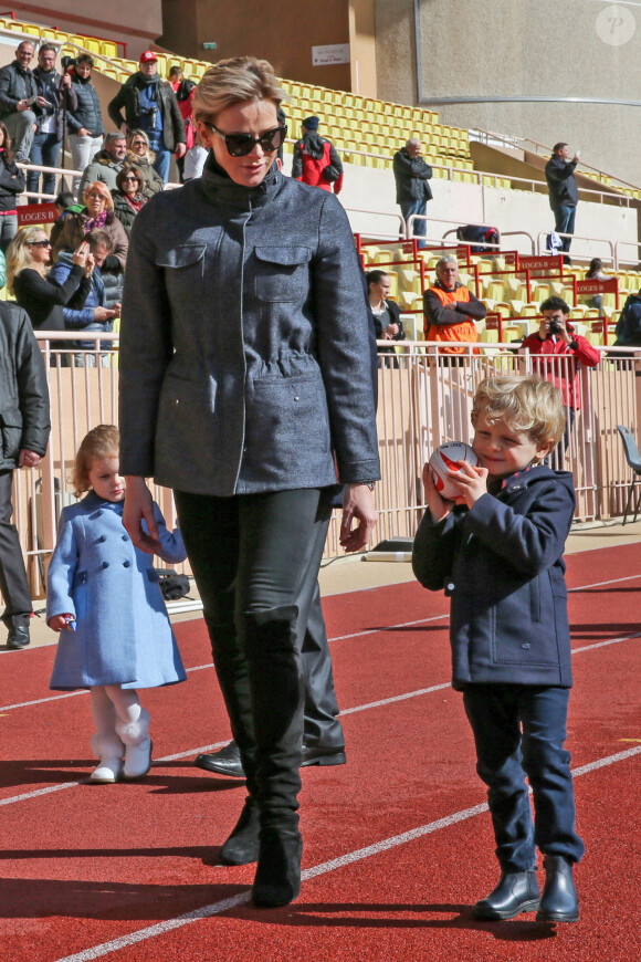 La princesse Charlene de Monaco et son fils le prince Jacques de Monaco - 8ème édition du tournoi de rugby Sainte-Dévote au Stade Louis II à Monaco, le 31 mars 2018. © Olivier Huitel/Pool Monaco/Bestimage 