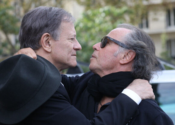 Francis Huster et Michel Leeb - Les célébrités et la famille quittent l'église Saint François-Xavier après les Obsèques du comédien Jean Piat à Paris le 21 septembre 2018.