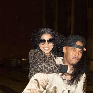 Exclusif - Nicki Minaj et son nouveau compagnon Kenneth "Zoo" Petty quittent l'hôtel Royal Monceau et vont poser en photo devant la tour Eiffel à Paris le 8 mars 2019. 