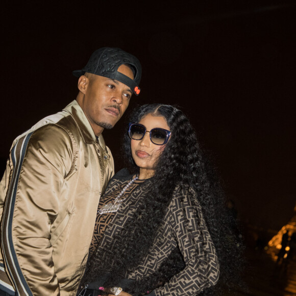 Exclusif - Nicki Minaj et son nouveau compagnon Kenneth "Zoo" Petty quittent l'hôtel Royal Monceau et vont poser en photo devant la tour Eiffel à Paris le 8 mars 2019.