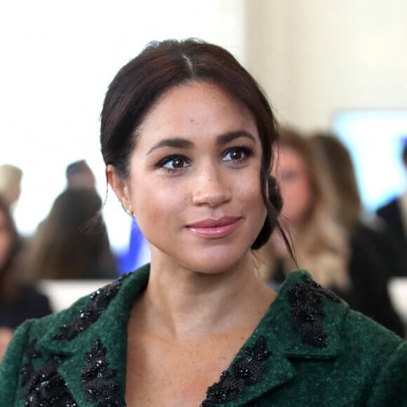 Meghan Markle la duchesse de Sussex enceinte et le prince Harry, duc de Sussex, assistent à une activité jeunesse le Jour du Commonwealth à la Maison du Canada le 11 mars 2019 à Londres.