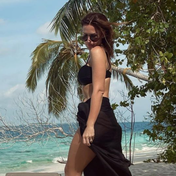 Vitaa sur la plage de l'île d'Hadahaa, aux Maldives.