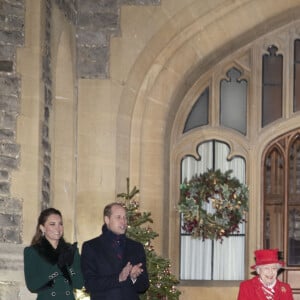 Catherine Kate Middleton, duchesse de Cambridge, le prince William, duc de Cambridge, la reine Elisabeth II d'Angleterre, le prince Charles, prince de Galles, Camilla Parker Bowles, duchesse de Cornouailles - La famille royale se réunit devant le chateau de Windsor pour remercier les membres de l'Armée du Salut et tous les bénévoles qui apportent leur soutien pendant l'épidémie de coronavirus (COVID-19) et à Noël le 8 décembre 2020.