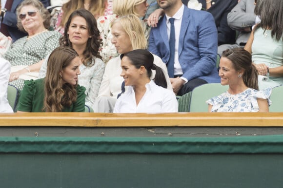 Catherine (Kate) Middleton, duchesse de Cambridge, Meghan Markle, duchesse de Sussex, et Pippa Middleton dans les tribunes lors de la finale femme de Wimbledon "Serena Williams - Simona Halep (2/6 - 2/6) à Londres, le 13 juillet 2019.