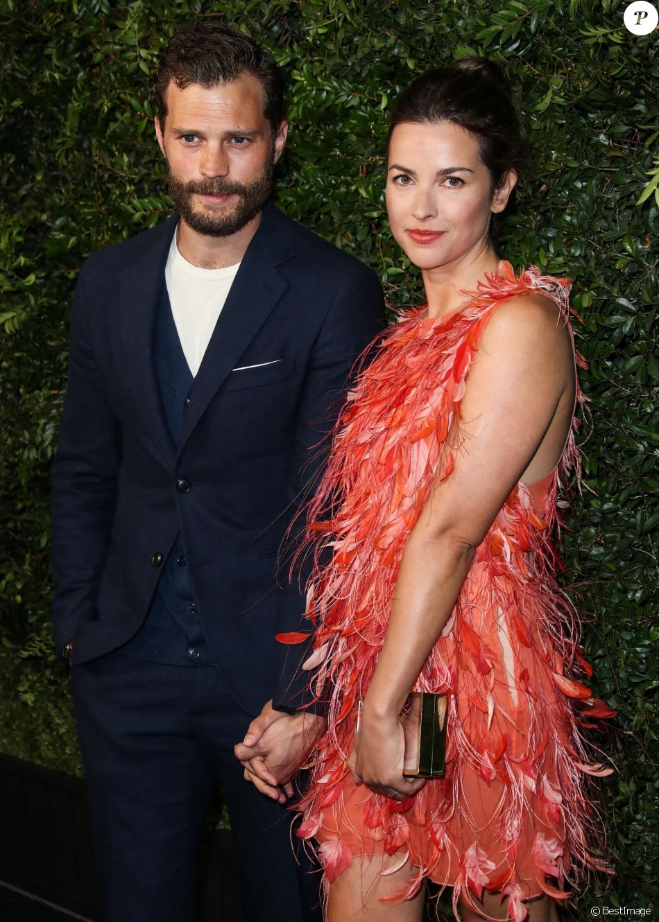 Jamie Dornan et sa femme Amelia Warner lors du dîner "Chanel and Charles Finch Pre-Oscar Awards" au restaurant Madeo à Los Angeles.