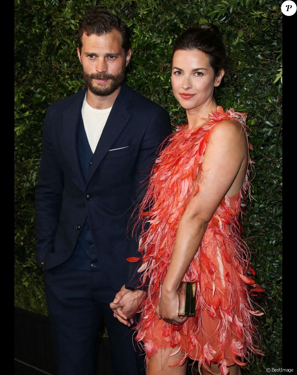 Jamie Dornan et sa femme Amelia Warner lors du dîner "Chanel and Charles Finch Pre-Oscar Awards" au restaurant Madeo à Los Angeles.
