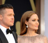Brad Pitt et Angelina Jolie - Pressroom - 86ème cérémonie des Oscars à Hollywood, le 2 mars 2014. 