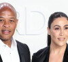 Dr. Dre et Nicole Young posent avant d'assister au défilé Tom Ford: Autumn/Winter 2020 aux Milk Studios dans le quartier de Hollywood à Los Angeles, le 7 février 2020.