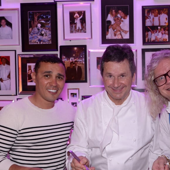 Exclusif - Brahim Asloum, le chef Christophe Leroy, Pierre-Jean Chalençon lors d'une soirée blanche dans un appartement à Paris le 1er juillet 2020. © Rachid Bellak / LMS / Bestimage