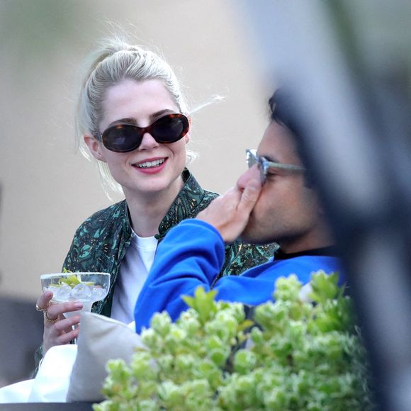 Exclusif - Rami Malek et sa compagne Lucy Boynton profitent du soleil sur la terrasse de l'hôtel Esplanade à Zagreb, le 22 avril 2021.