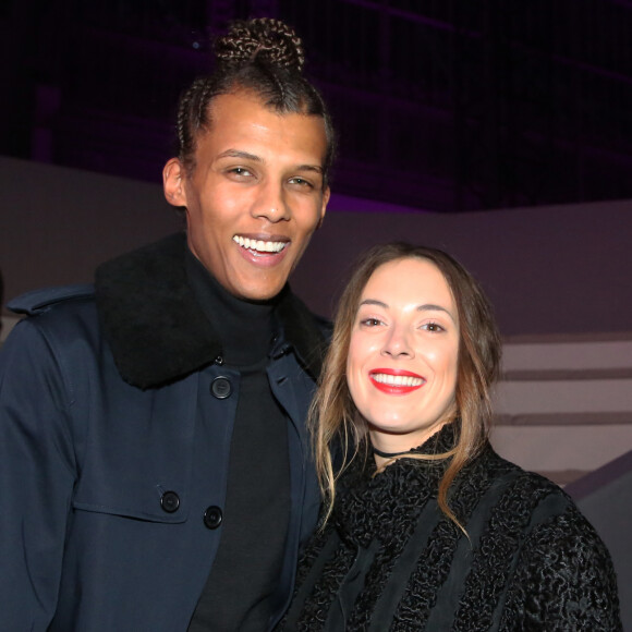 Stromae et sa femme Coralie Barbier au défilé "Victoria's Secret" au Grand Palais à Paris © Denis Guignebourg/Bestimage 
