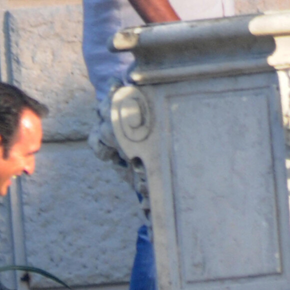George Clooney et Jean Dujardin tournent la nouvelle publicité Nespresso à Cernobbio, le 28 août 2014.