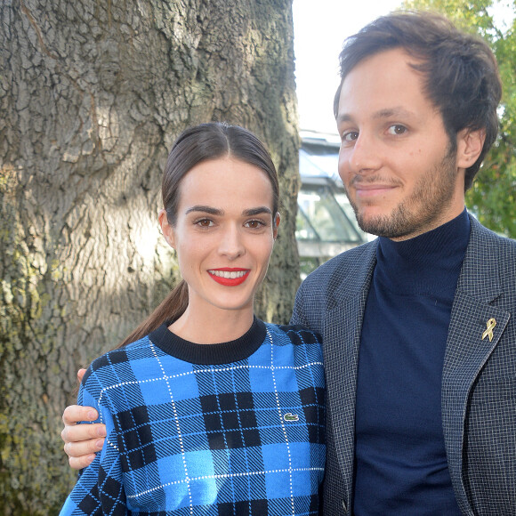 Semi-Exclusif - Vianney Bureau (Vianney), sa compagne Catherine Robert - People au défilé Lacoste Collection Prêt-à-Porter Printemps/Eté 2020 lors de la Fashion Week de Paris, le 1er octobre 2019. © Veeren Ramsamy-Christophe Clovis/Bestimage  Semi-Exclusive - People attends the Lacoste Womenswear Spring/Summer 2020 show as part of Paris Fashion Week on October 1st, 2019 in Paris, France. 