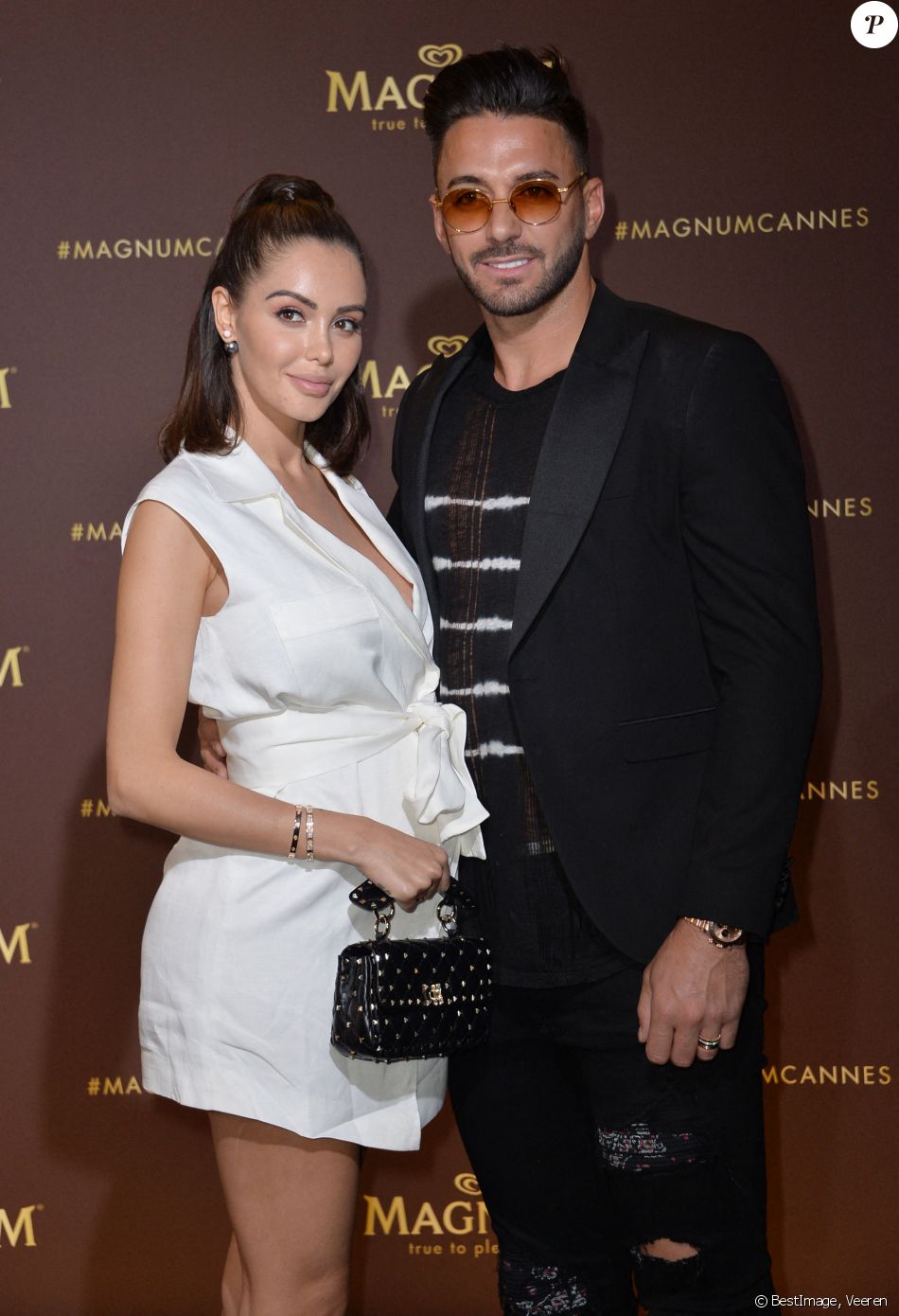 Nabilla Benattia (enceinte) et son mari Thomas Vergara au photocall de l'after party "Magnum x Rita Ora" sur la plage privée Magnum lors du 72ème Festival International du Film de Cannes, France,le 16 mai 2019. © Veeren/Bestimage