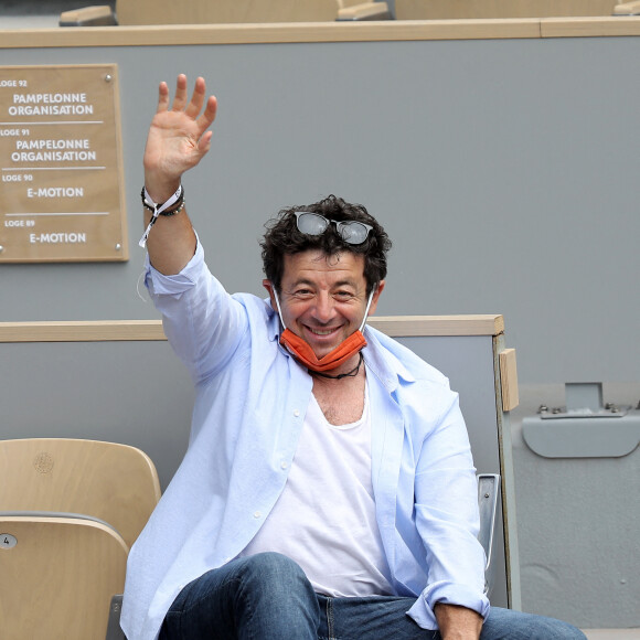 Patrick Bruel dans les tribunes des internationaux de France Roland Garros à Paris le 12 juin 2021. © Dominique Jacovides / Bestimage 