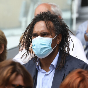 Christian Karembeu dans les tribunes des internationaux de France Roland Garros à Paris le 12 juin 2021. © Dominique Jacovides / Bestimage 