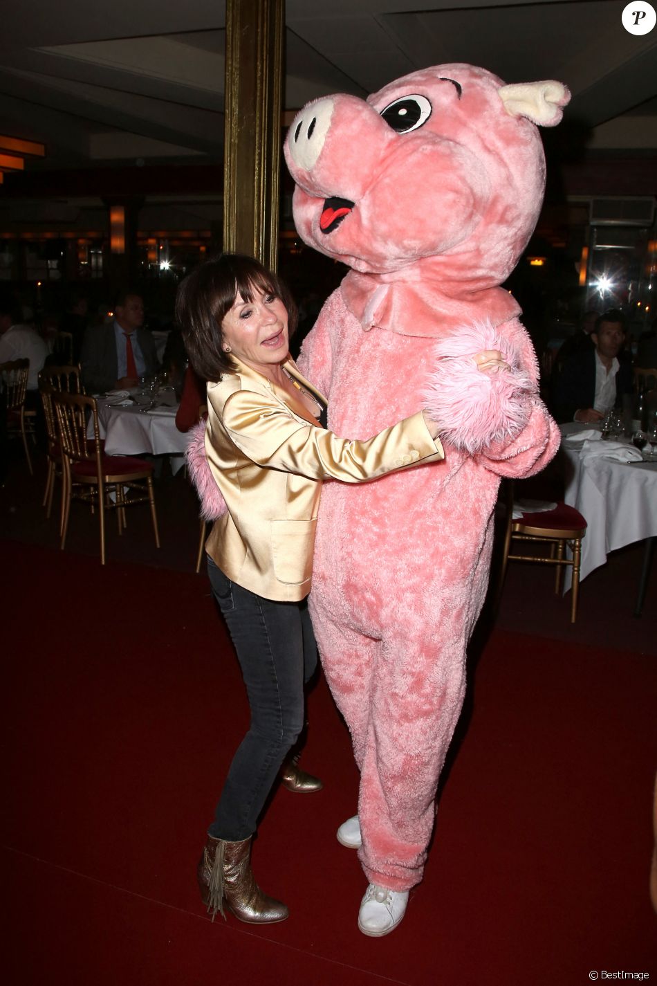 Danièle Evenou, Christophe Beaugrand déguisé en cochon - Soirée "La charcuterie fait son show" au Chalet du Lac à Paris, le 10 juin 2013.