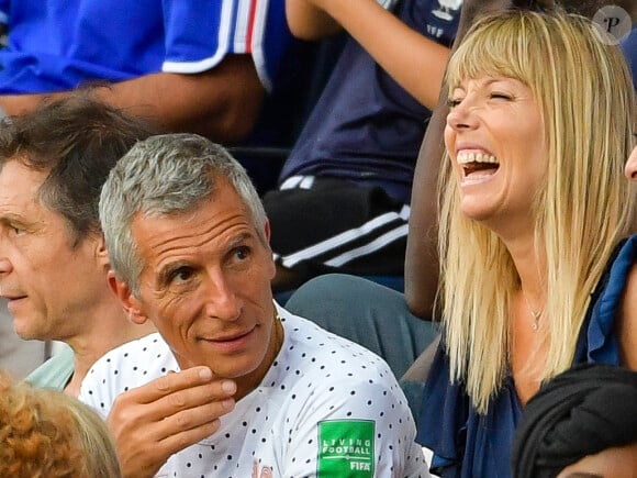 Nagui et sa femme Mélanie Page dans les tribunes lors du quart de finale de la Coupe du Monde Féminine de football opposant les Etats-Unis à la France au Parc des Princes à Paris, France, le 28 juin 2019. Les USA ont gagné 2-1. © Pierre Perusseau/Bestimage 