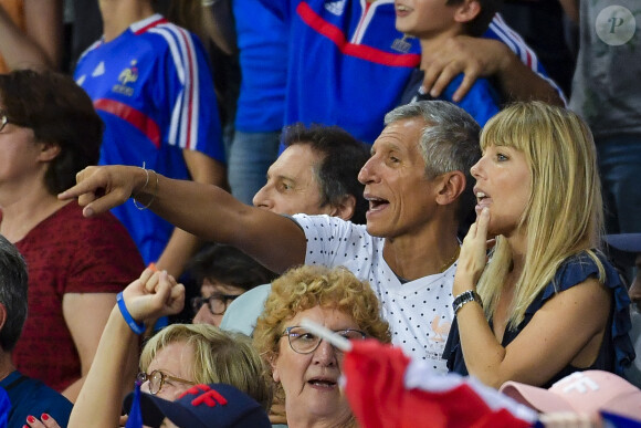 Nagui et sa femme Mélanie Page et Leïla Kaddour-Boudadi dans les tribunes lors du quart de finale de la Coupe du Monde Féminine de football opposant les Etats-Unis à la France au Parc des Princes à Paris, France, le 28 juin 2019. Les USA ont gagné 2-1. © Pierre Perusseau/Bestimage