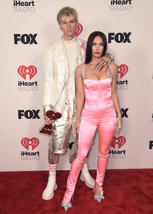 Megan Fox et son compagnon Machine Gun Kelly assistent à la cérémonie des iHeartRadio Music Awards 2021 au Dolby Theatre. Los Angeles, le 27 mai 2021.