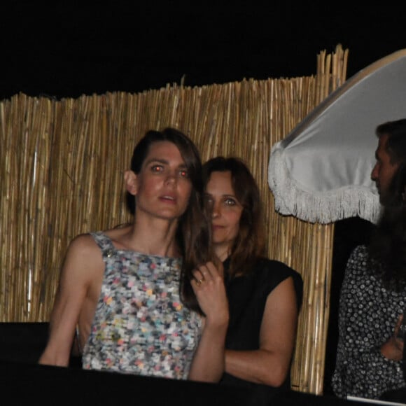 Charlotte Casiraghi et Dimitri Rassam à la soirée Chanel organisée en marge du Festival de Cannes, le 7 juillet 2021.