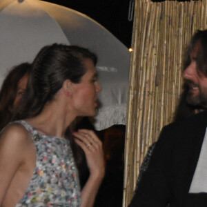 Charlotte Casiraghi et Dimitri Rassam à la soirée Chanel organisée en marge du Festival de Cannes, le 7 juillet 2021.