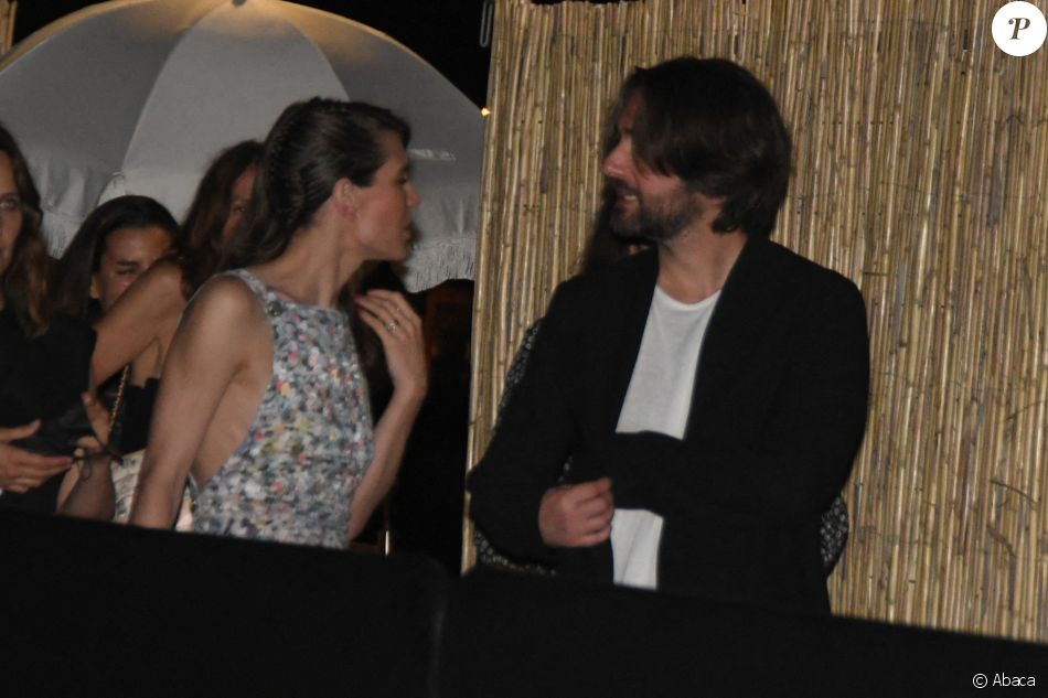 Charlotte Casiraghi et Dimitri Rassam à la soirée Chanel organisée en marge du Festival de Cannes, le 7 juillet 2021.