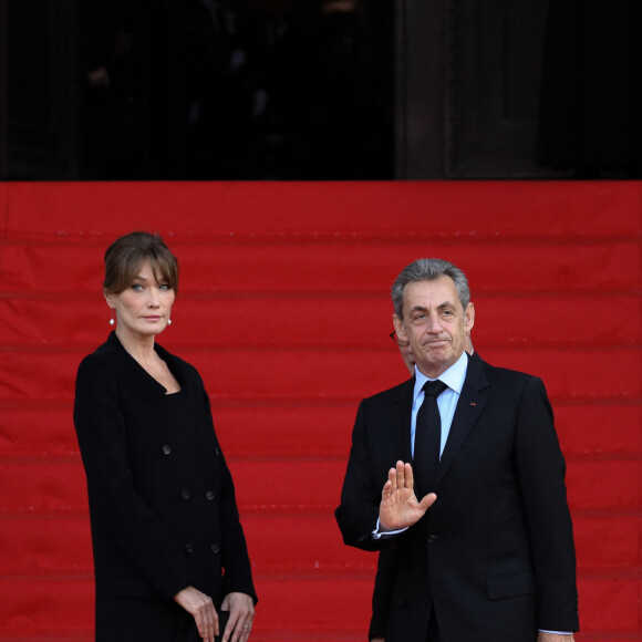 Nicolas Sarkozy et sa femme Carla Bruni pour les obsèques de l'ancien président de la République Jacques Chirac à Paris. Un service solennel sera présidé par le président de la République. Le 30 septembre 2019 © Stéphane Lemouton / Bestimage 