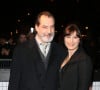 Samuel Labarthe et sa femme Helene Medigue arrivent à l'avant-première du film 'The Monuments men' à l'UGC Normandie sur les Champs-Elysées à Paris le 12 Février 2014.