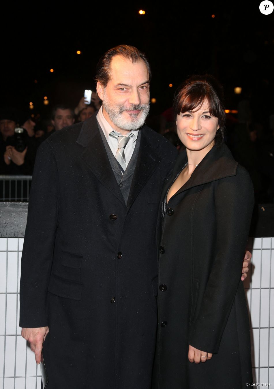 Samuel Labarthe et sa femme Helene Medigue arrivent à l&#039;avant-première du film &#039;The Monuments men&#039; à l&#039;UGC Normandie sur les Champs-Elysées à Paris le 12 Février 2014.