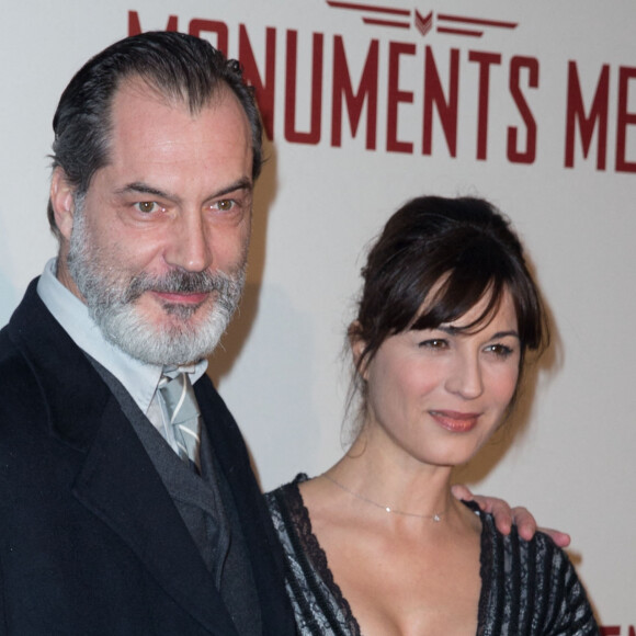 Samuel Labarthe et sa femme Helene Medigue (robe Christophe Guillarmé) - Première du film "Monuments Men" à l'UGC Normandie à Paris le 12 février 2014.