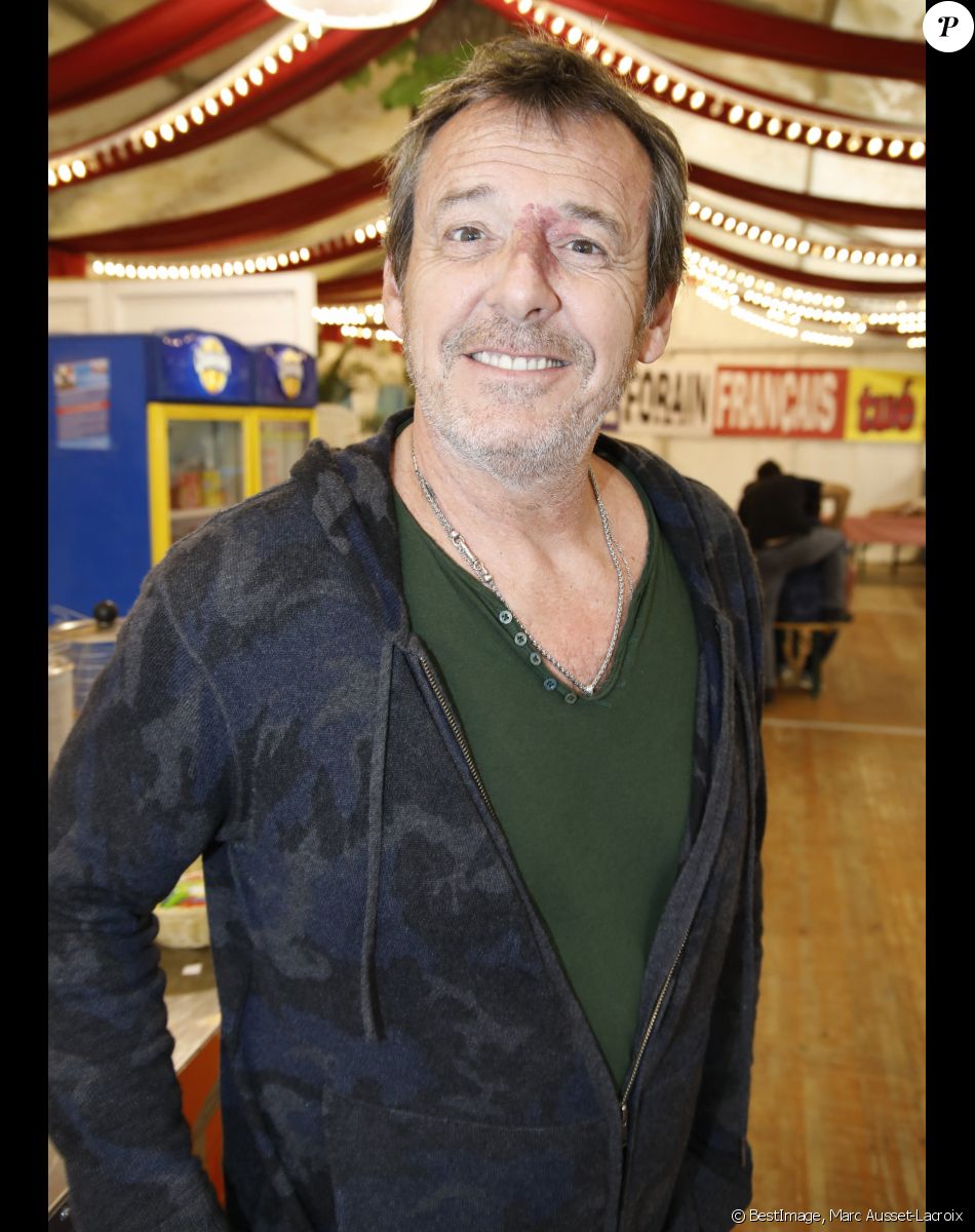 Exclusif - Jean-Luc Reichmann et Marcel Campion lors de la remise du chèque pour l'association "ADICARE (Association pour le Développpement des Innovations en Cardiologie, Recherche et Enseignement)" à la Foire du Trône. Paris, le 21 mai 2019. © Marc Ausset-Lacroix/Bestimage